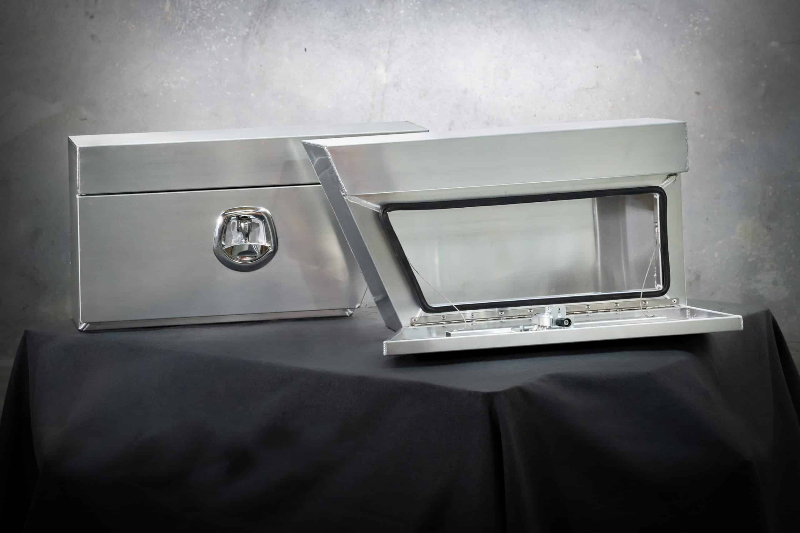 Pair of flat-plate alloy toolboxes featuring whale tail locks