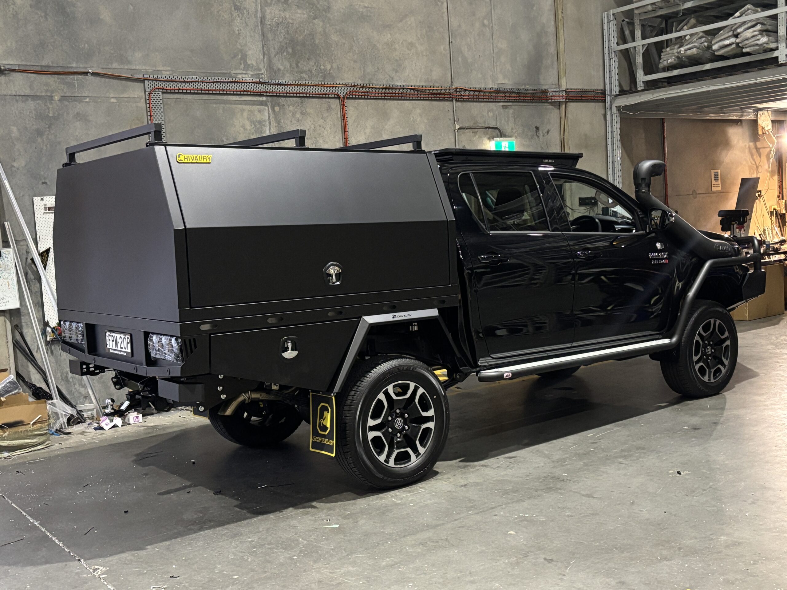 Sleek black aluminium canopy with clean, flat sides