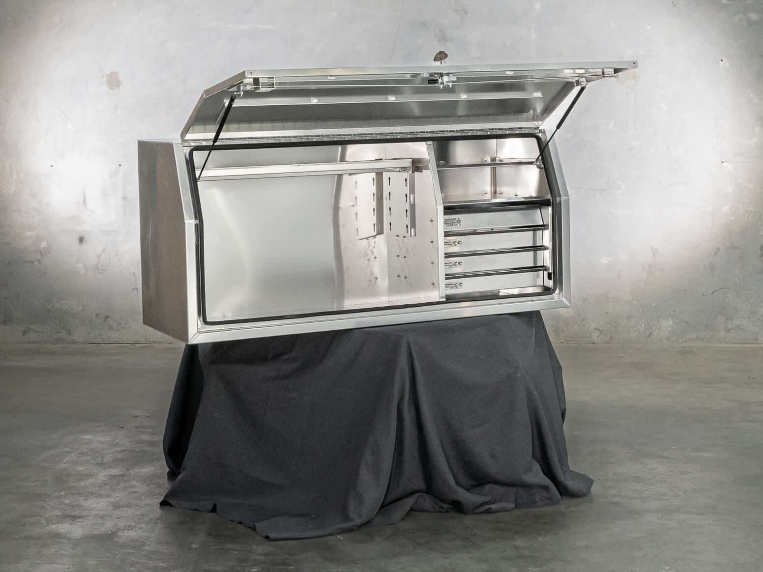 Alloy toolbox designed for weatherproof tool storage with internal drawers