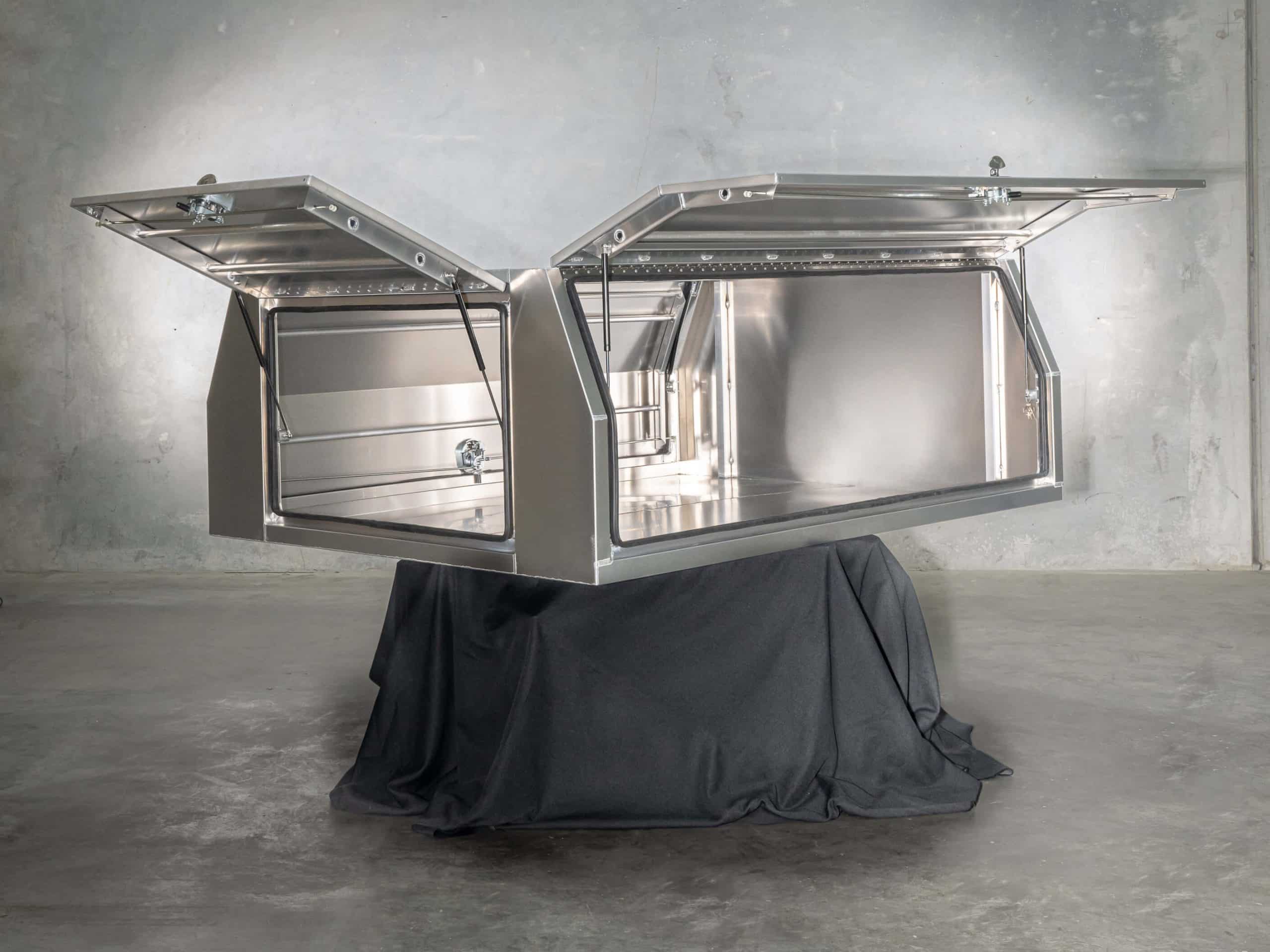 Closed view of a 3-door aluminium UTE canopy with whale tail locks