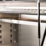 Durable alloy toolbox with reinforced lid and gas strut supports