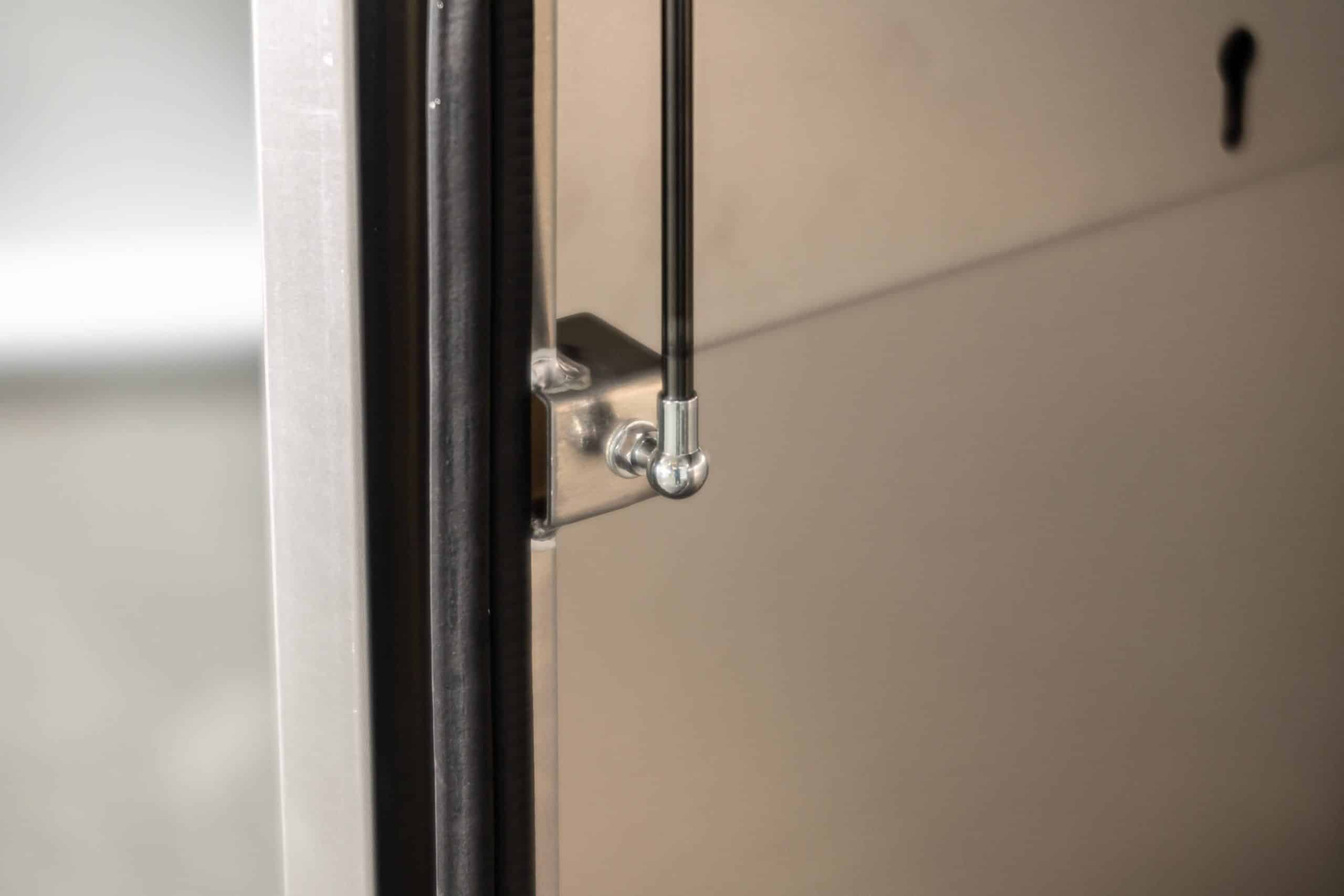 UTE canopy door supported by dual gas struts for smooth opening