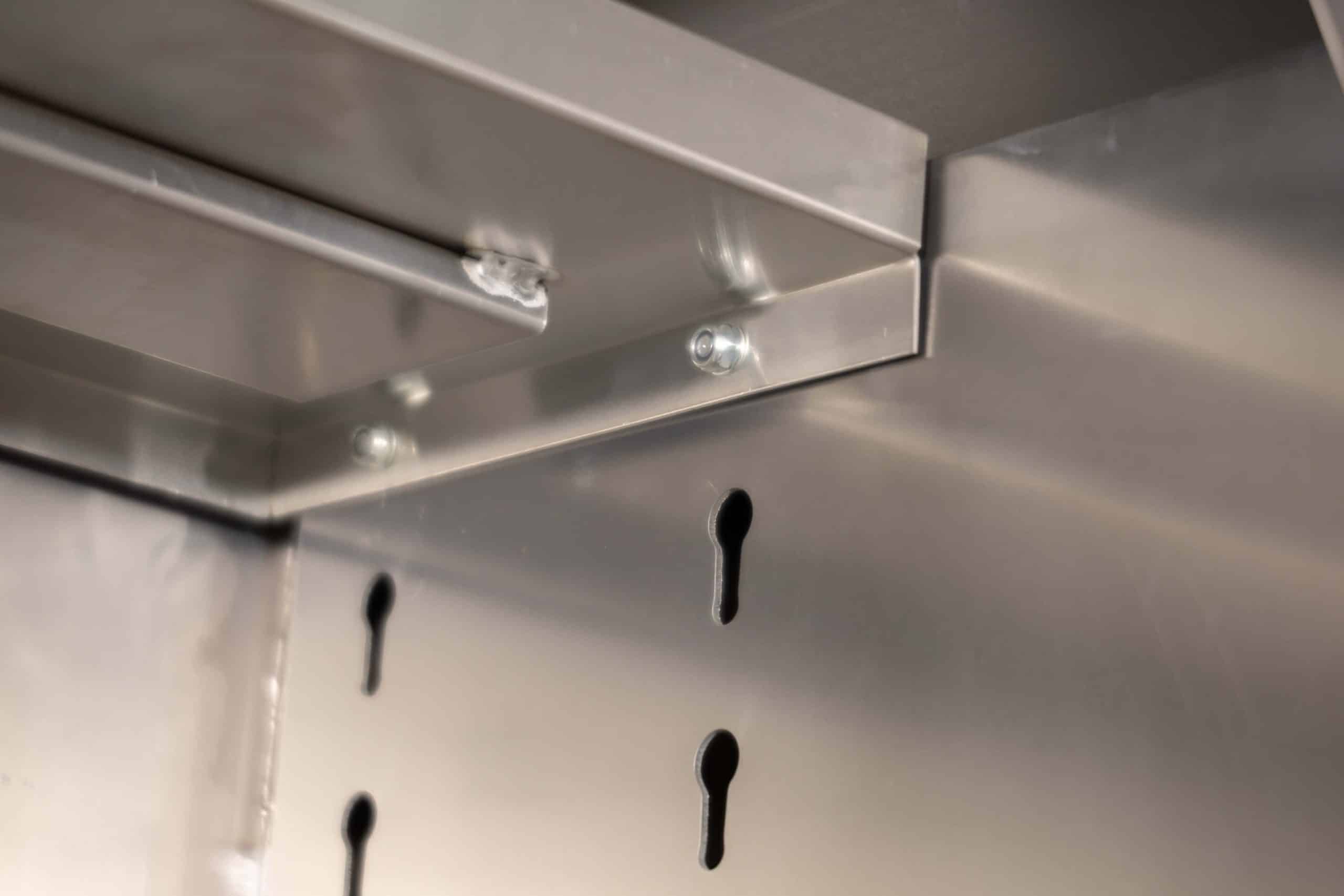 Heavy-duty canopy showing framed shelving system with soft-close fittings
