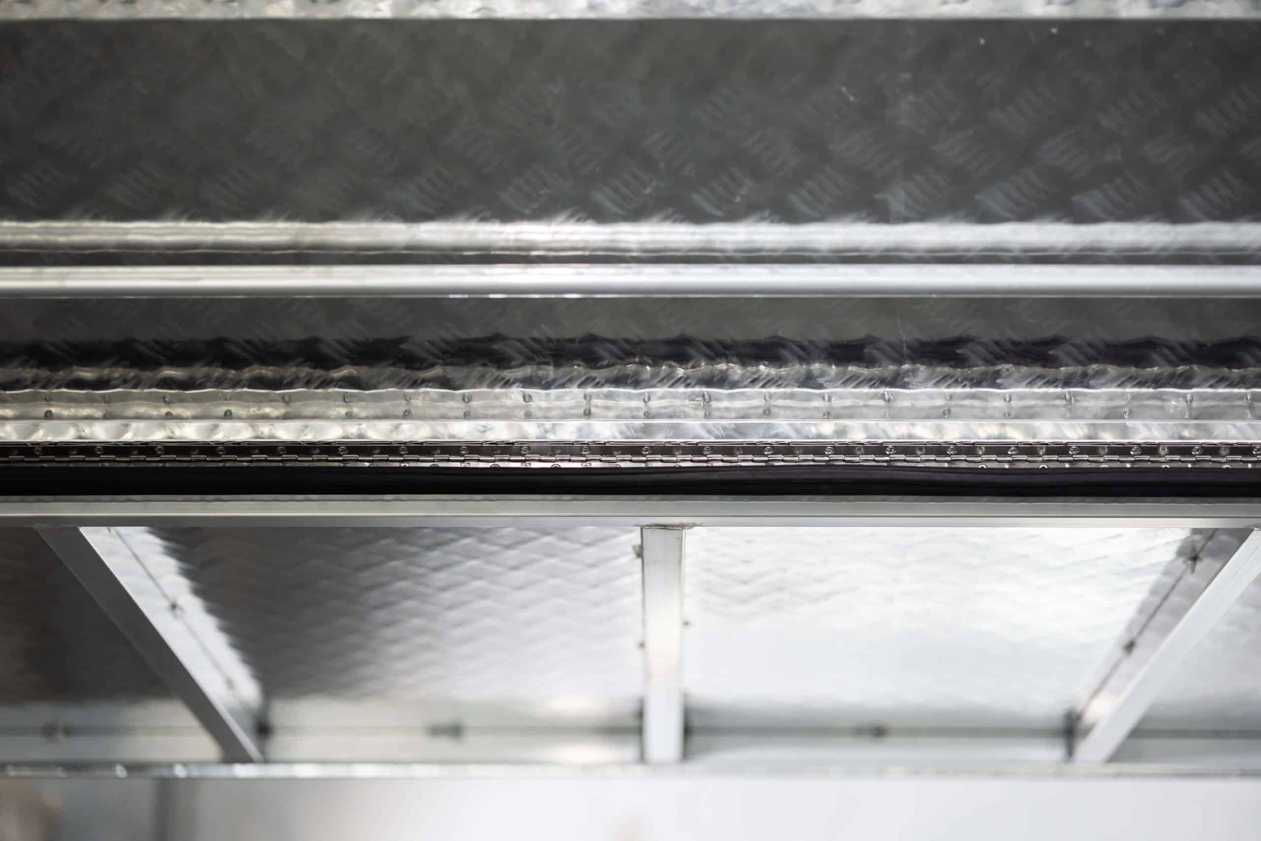 Close-up of the aluminium UTE canopy roof showing internal bracing and weather-sealed joints