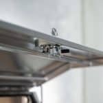 Detailed view of the internal locking mechanism on a UTE canopy door