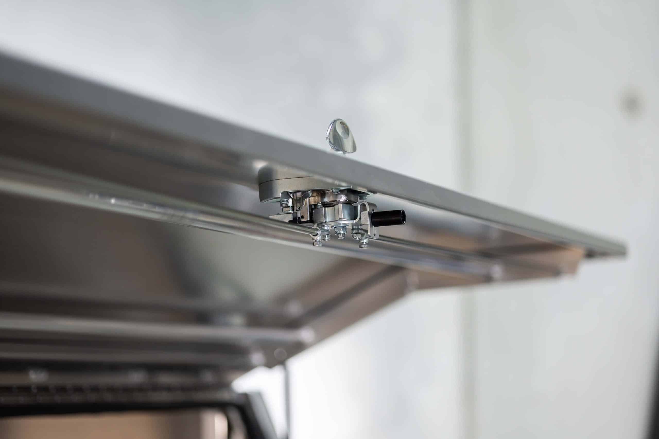 Detailed view of the internal locking mechanism on a UTE canopy door