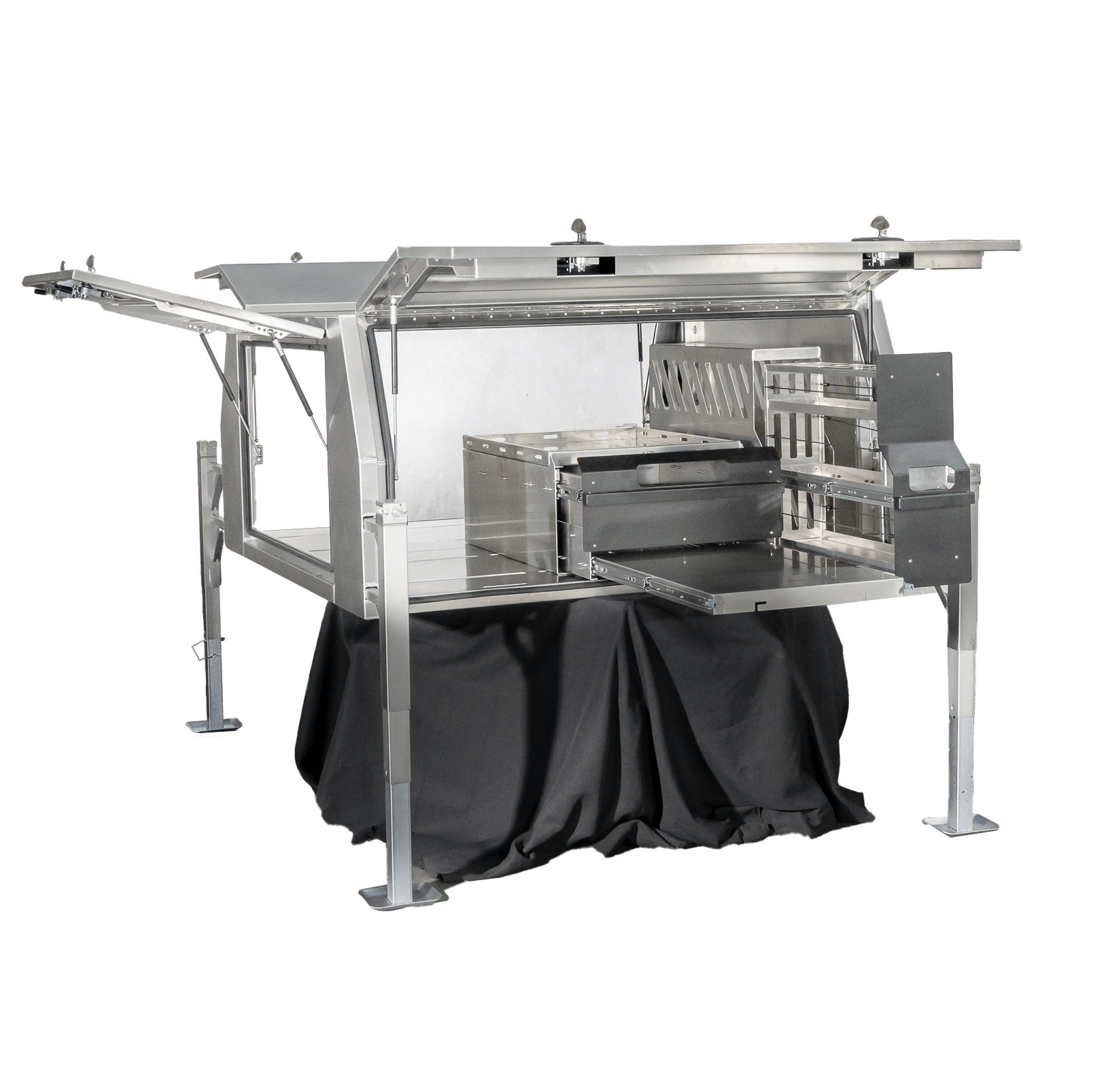 Interior setup of UTE canopy featuring cutting board and storage units