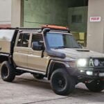 The X3 LC79 Combo Full UTE Canopy set up from Oz Chivalry is a complete UTE setup featuring a heavy-duty tray, canopy, roof rack, and storage options