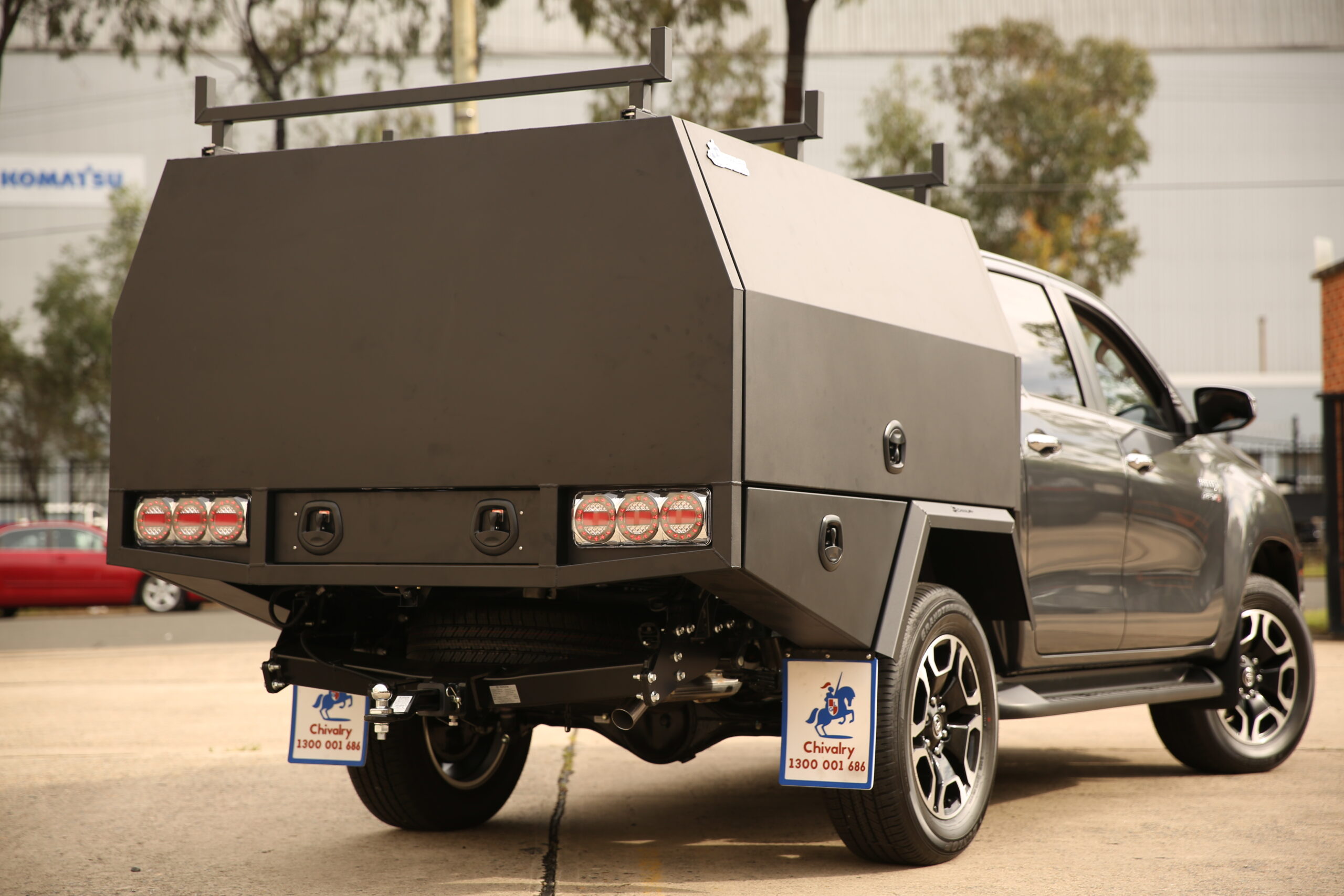 Matte black aluminium service body with two side-opening doors