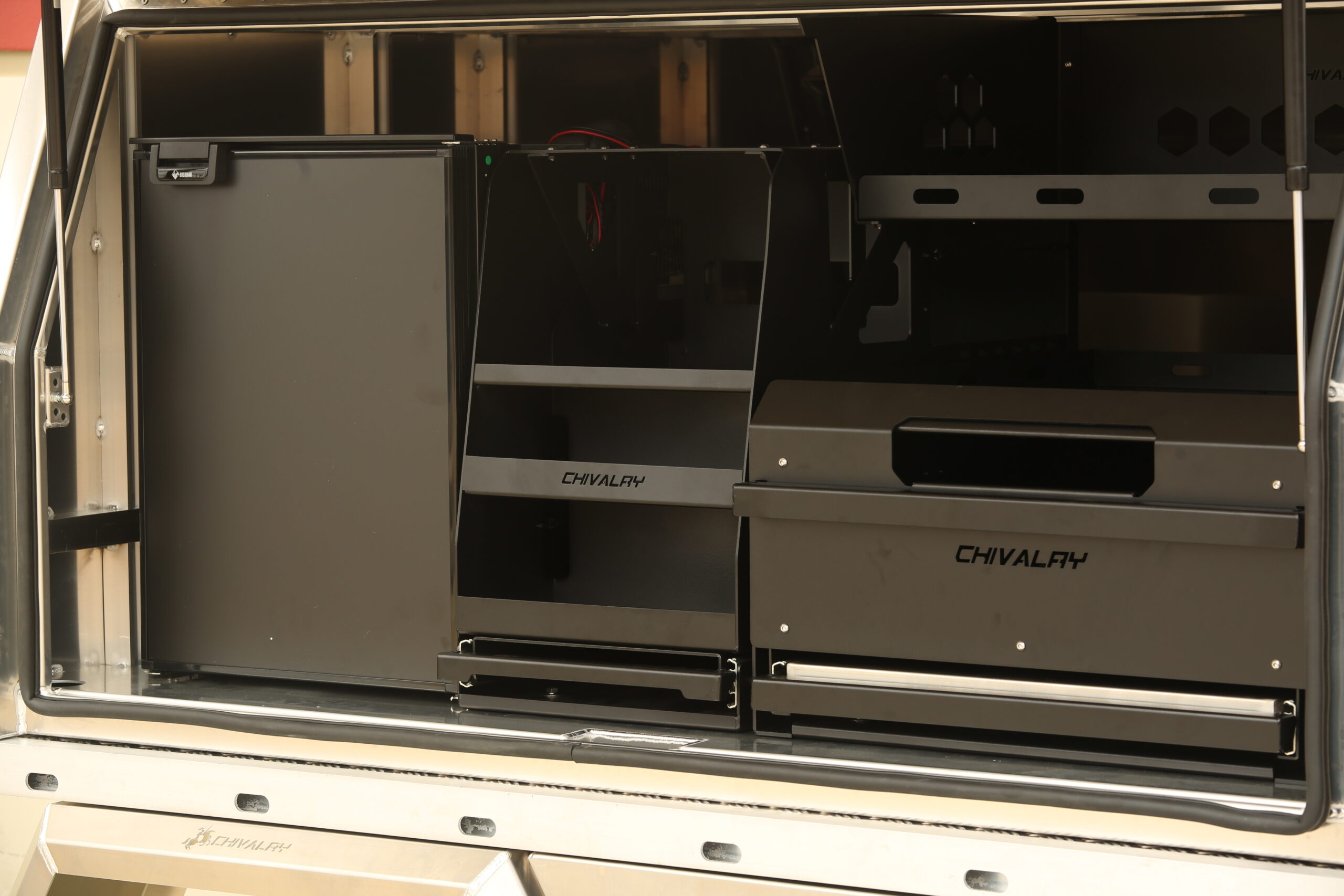 Reliable touring UTE canopy complete with pantry, cutting board, and drawers
