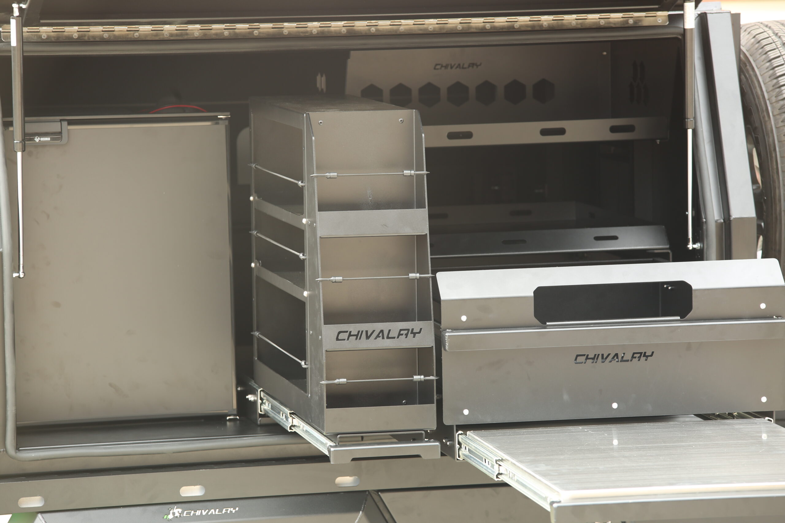 Heavy-duty canopy with multiple internal compartments and shelving