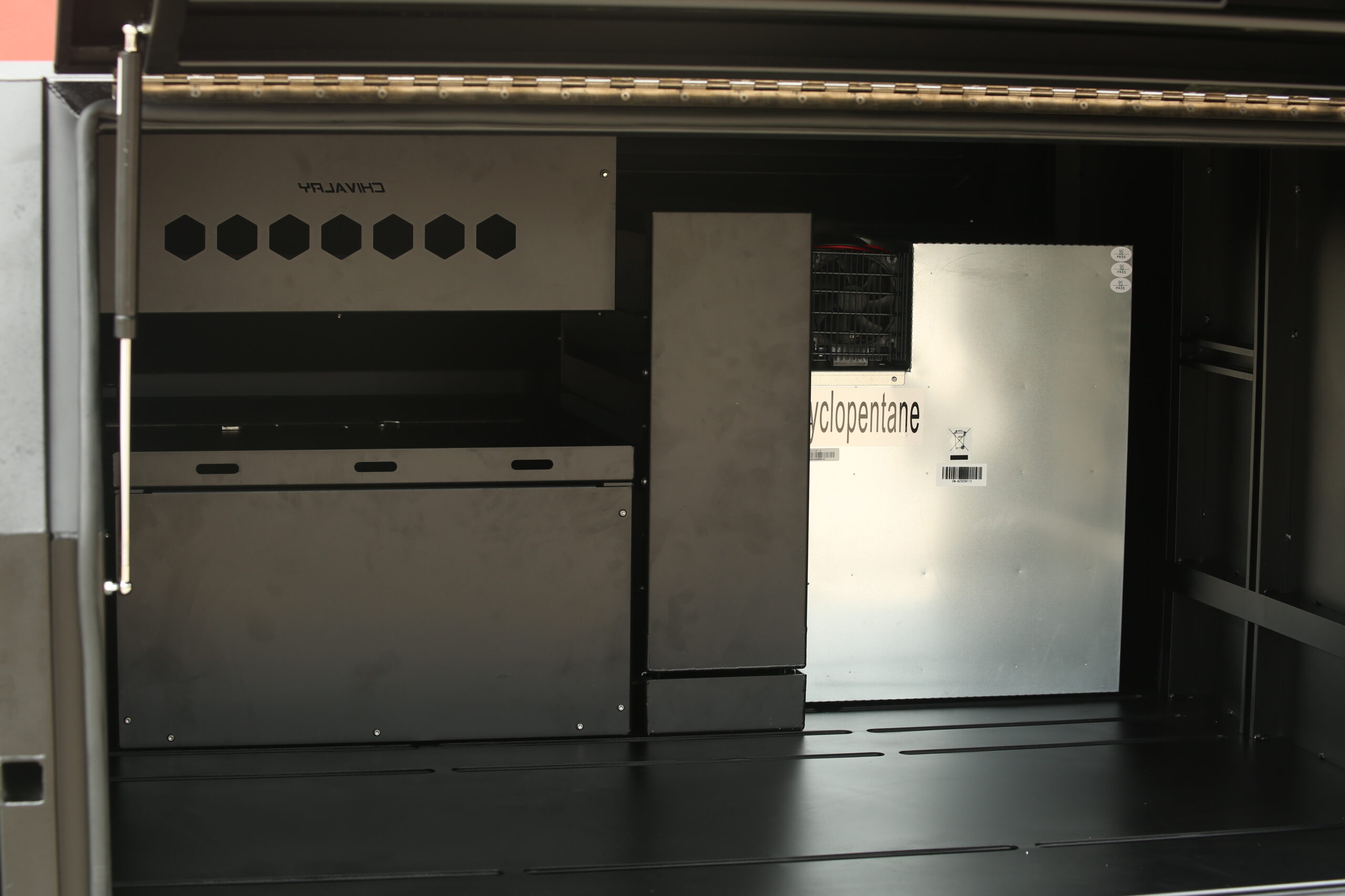 Heavy-duty canopy interior featuring adjustable shelving and compartments