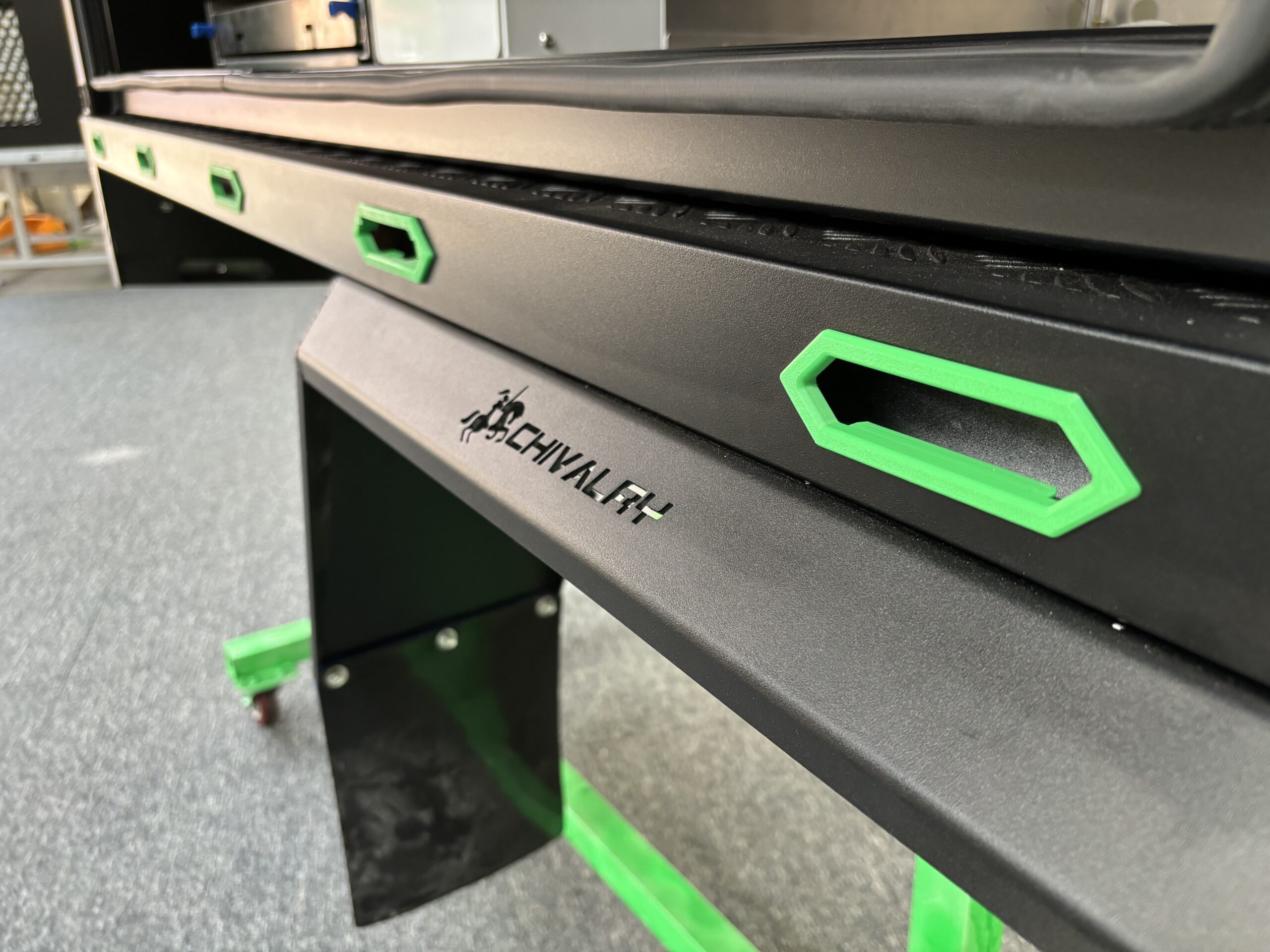Close-up of a Chivalry UTE canopy frame featuring green side rope covers for protection and visual contrast