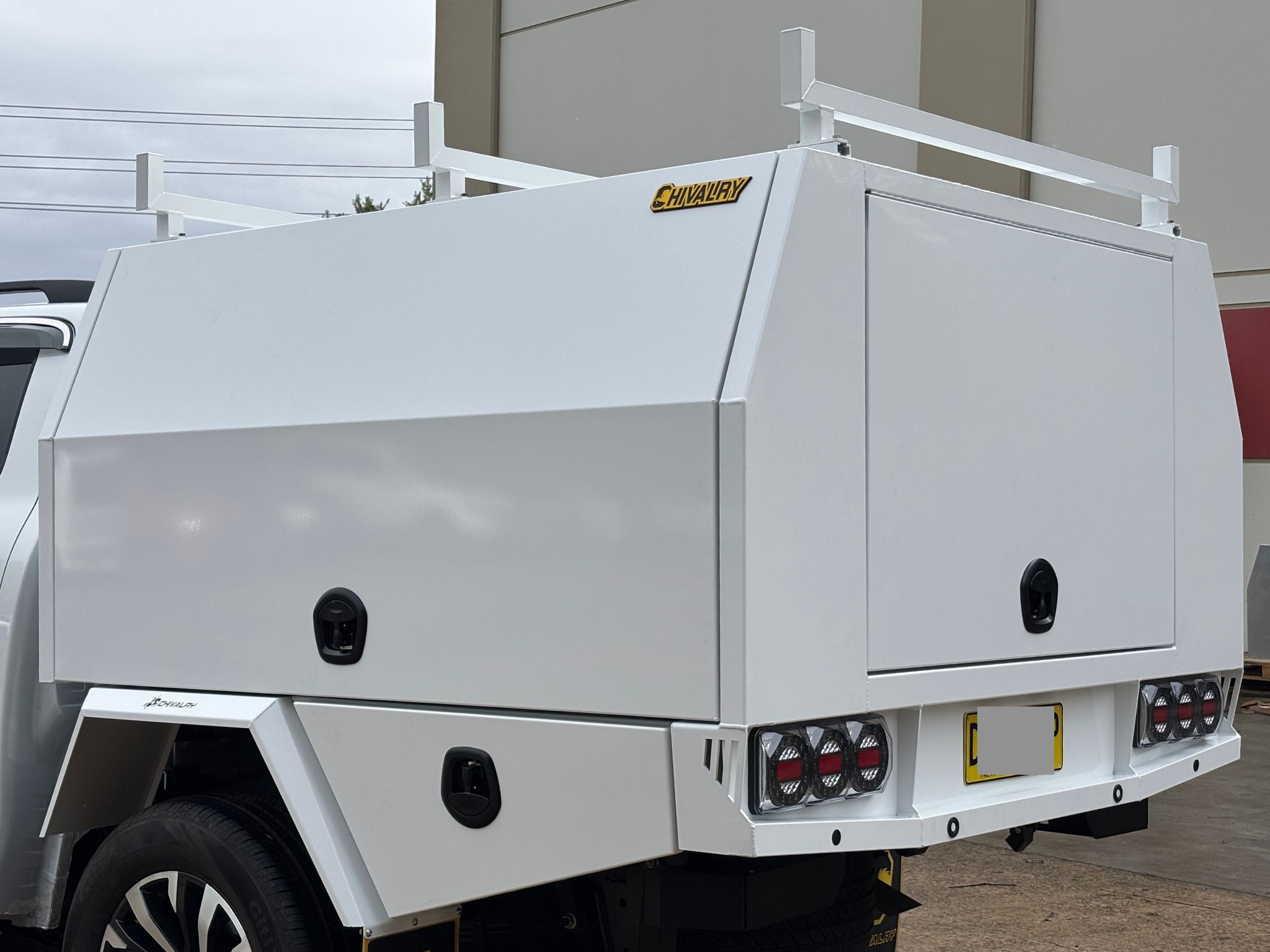 Large aluminium service body with under-tray toolboxes and LED lights