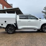 Clean white service body with unistrut floor and secure locking system