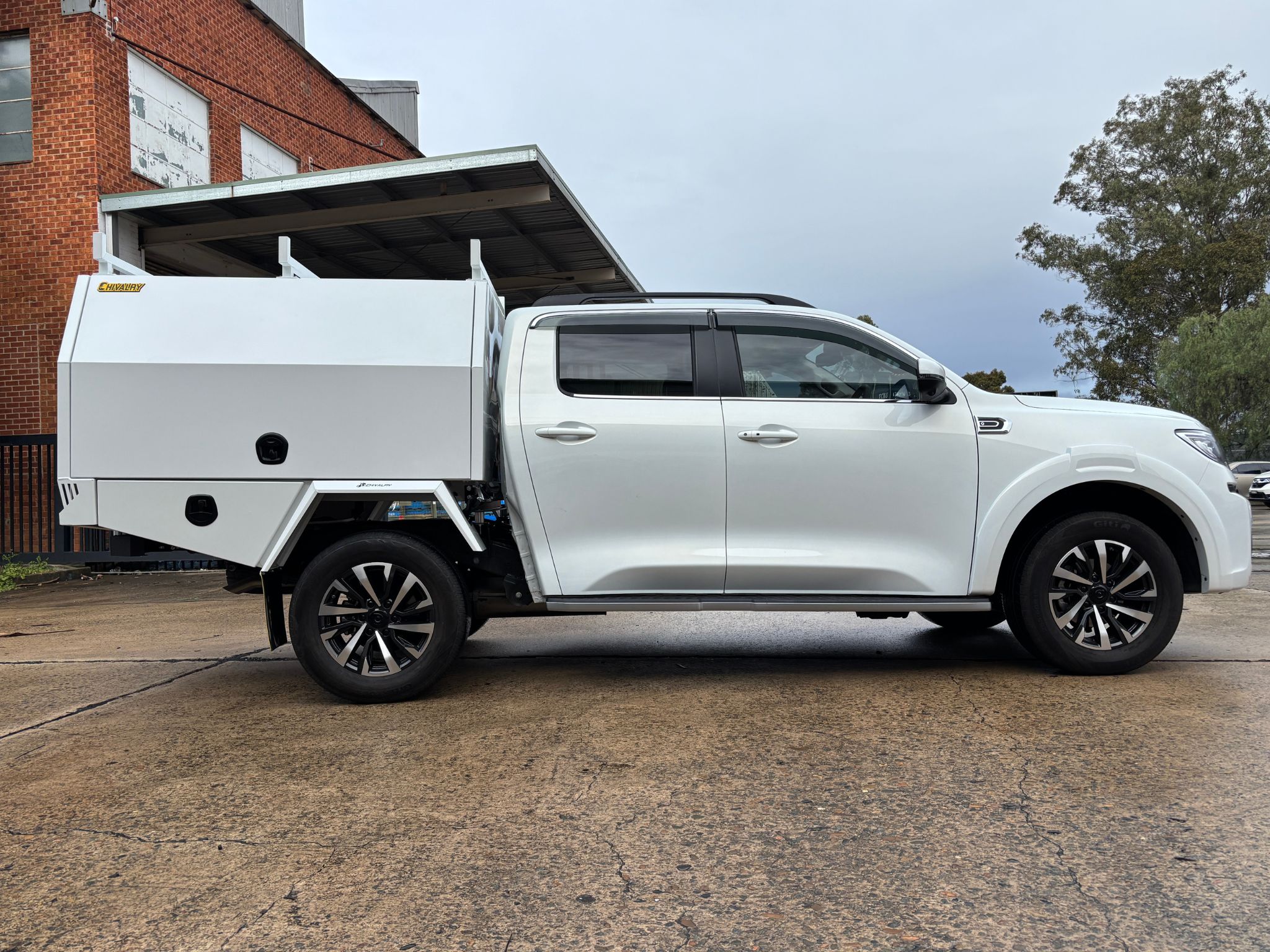 Clean white service body with unistrut floor and secure locking system